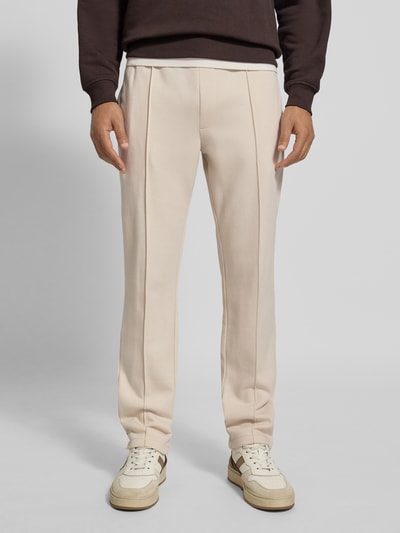 MCNEAL Spodnie dresowe o kroju regular fit z kieszenią z tyłu Piaskowy 4