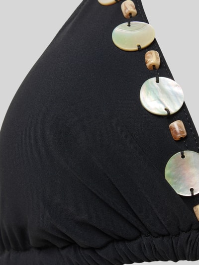 Frauenmodel trägt Bikini mit Schnürung Modell 'YERODASIA KERANGA' von Banana Moon aus Material-Mix mit Stretch-Anteil, Detailaufnahme.