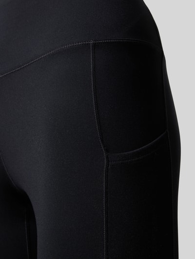 Produktfoto, schwarze Slim Fit Leggins mit Logo-Print von NIKE TRAINING aus elastischem Material-Mix und breitem Bund, glatte Textur