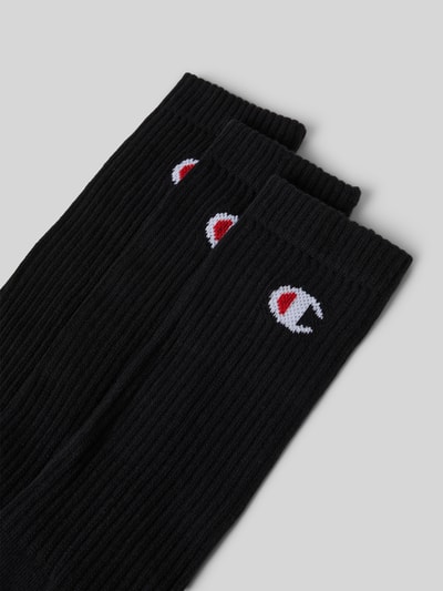 Produktfoto, Skarpety z zestawu 3 szt. Crew Socks od Champion, mieszanka bawełny i elastanu, prążkowany ściągacz, jednokolorowe, detal z logo
