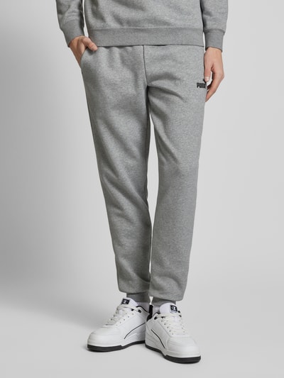 PUMA PERFORMANCE Sweatpants mit Logo-Stitching Mittelgrau Melange 4