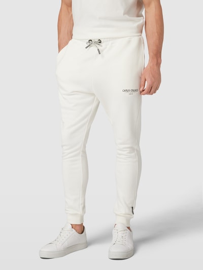CARLO COLUCCI Spodnie dresowe z detalami z logo Złamany biały 4