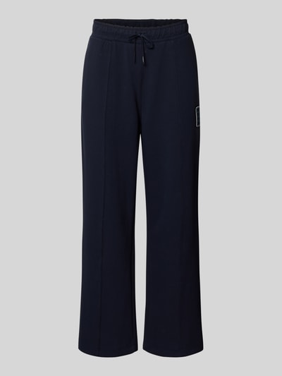 Lacoste Spodnie dresowe w kroju loose fit z mieszanka bawełny model 'Tenn' Orzechowy 1