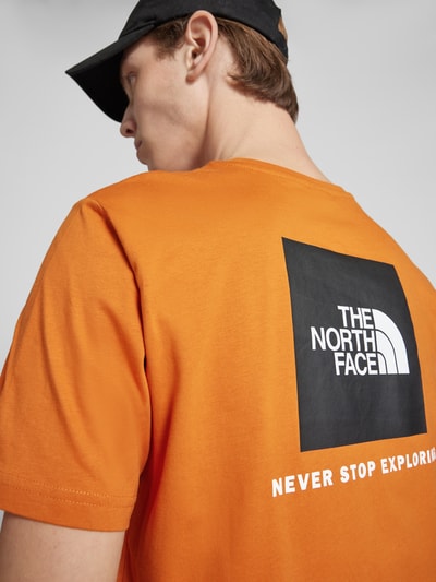 The North Face T-shirt z nadrukiem z logo model ‘REDBOX’ Pomarańczowy 3