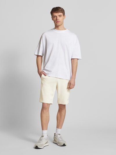 PUMA PERFORMANCE Regular Fit Sweatshorts mit Label-Stitching Offwhite 1