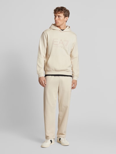 EA7 Emporio Armani Baggy fit sweatpants met labelprint Offwhite - 1