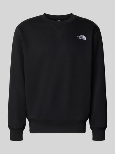 Produktfoto, Relaxed Fit Sweatshirt mit Label-Stitching Modell 'ESSENTIAL' von The North Face, czarny, mieszanka bawełny, okrągły dekolt, wyhaftowane logo, elastyczne wykończenia, długość tyłu w rozmiarze M: 71 cm, długość rękawów w rozmiarze M: 66 cm