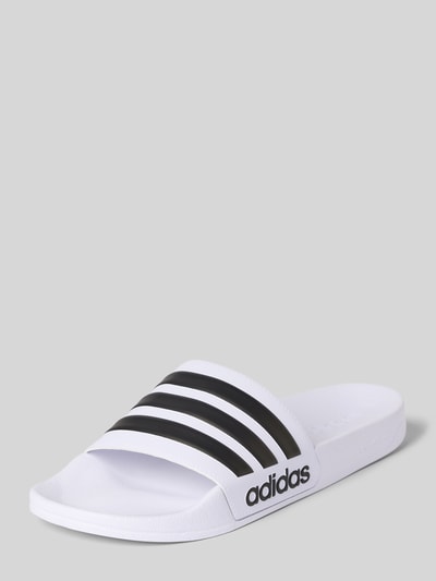 Productfoto, Badeschuhe mit Label-Prägung Modell 'ADILETTE SHOWER' van adidas Sportswear in effen kleuren met streepapplicaties, comfortmodel/open, gestructureerde zool