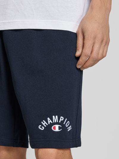 CHAMPION Baggy Fit Sweatshorts mit Label-Stitching Dunkelblau 3