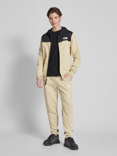 The North Face Regular Fit Sweatpants mit Label-Print Modell 'ICONS' Beige 1