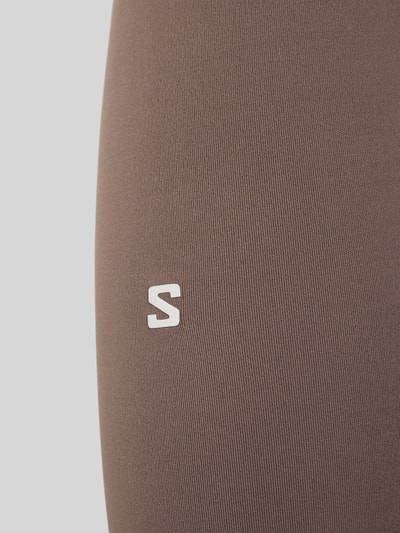 Produktfoto, braune Damen Leggings mit sichtbarer Textur, elastischer Bund, enger Passform im Elastischer-Material-Mix, Modell 'SHKOUT' von Salomon