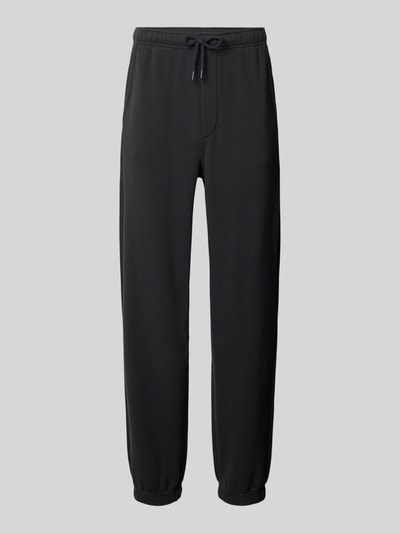 Produktfoto, Sweatpants mit Eingrifftaschen Modell 'ATUBAY' von American Vintage, Baumwoll-Elasthan-Mix, Relaxed-Fit, elastischer Bund, Tunnelzug, schwarz, glatte Textur, Herren, Innenbeinlänge bei Größe M/L: 77 cm
