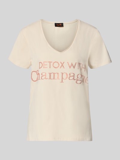 Produktfoto, Loose Fit T-Shirt mit V-Ausschnitt von miss goodlife aus cremefarbenem Baumwoll-Elasthan-Mix, Statement-Print auf der Vorderseite