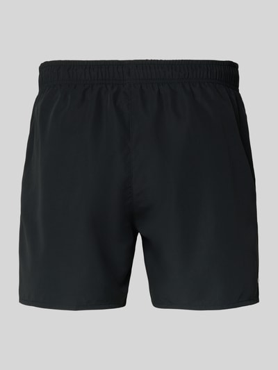 Produktfoto, schwarze Badeshorts mit Logo-Stitching von Lacoste, unifarbene Optik, elastischer Bund, seitliche Taschen, schnelltrocknend