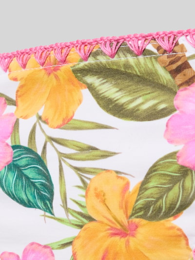 Produktfoto, Bikinihose mit seitlicher Schnürung Modell 'TORTUGA DIMKA' von Banana Moon, buntes Blumenmuster auf weißem Stoff, gehäkelter pinker Saum, Material-Mix mit Stretch-Anteil, glatte Textur, körpernahe Passform, Allover-Look.