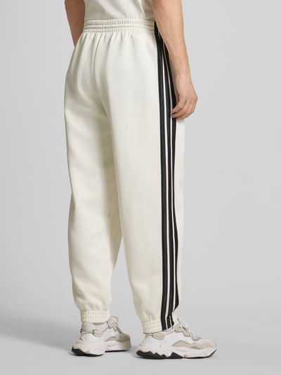 adidas Sportswear Relaxed fit sweatpants met logostitching, model 'Stadium' Offwhite - 5