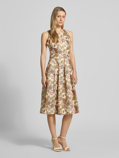 Frauenmodel trägt Midikleid aus Leinen im Allover-Look von WHITE LABEL mit A-Linie, Rundhalsausschnitt, floralen Mustern, Ganzkörperansicht von vorne, Rückenlänge bei Größe 36: 123 cm, Brustweite bei Größe 36: 44 cm.