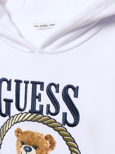 Produktfoto, Regular Fit Hoodie met logostitching van Guess voor kinderen, puur katoen, elastische afwerkingen, wit met geborduurd blauw logo en bruine beertjestextuur