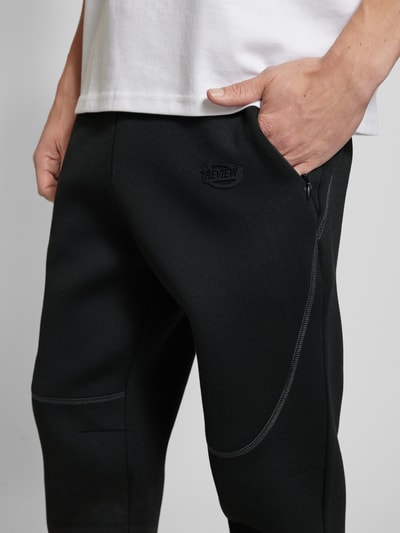 REVIEW Tapered Fit Sweatpants mit Label-Print Black 3