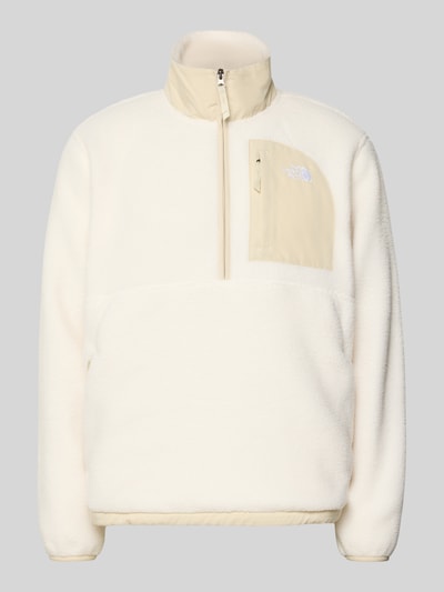 Produktfoto, Fleecepullover mit Napoleontasche Modell 'YUMIORI' von The North Face, cremeweißes Fleece, Troyerkragen, gerade Passform.