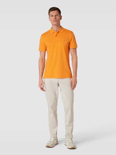 Christian Berg Men Koszulka polo o kroju slim fit w jednolitym kolorze Pomarańczowy 1