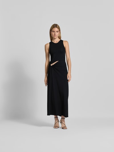 Frauenmodel trägt Maxikleid mit Cut-Out von Rabanne aus elastischem Baumwoll-Mix, Slim Fit, ärmellos, schwarz, Ganzkörperansicht von vorne.