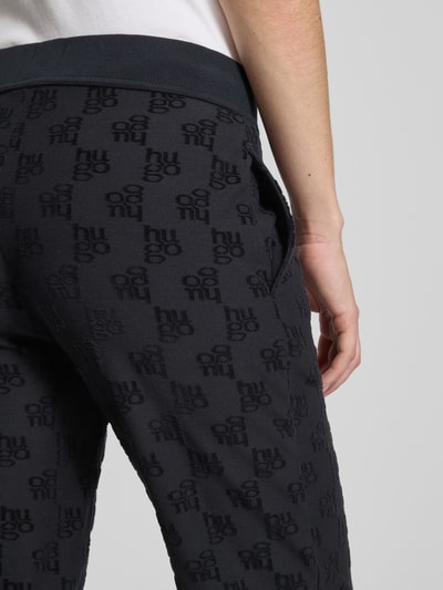 HUGO Slim fit sweatpants van katoenmix, model 'TERRYMONOGRAM' Zwart - 3