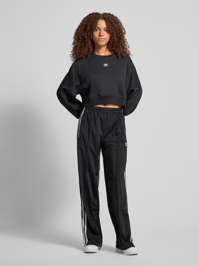 adidas Originals Flared sweatpants met vaste persplooien, model 'FIREBIRD' Zwart - 1