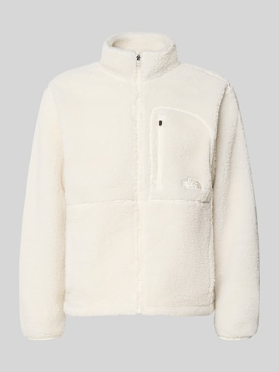 Produktfoto, Fleecejacke mit Stehkragen und Brusttasche Modell 'EXTREME PILE' von The North Face, biała, tekstura teddy, krój regular fit, kieszeń na piersi, naszycie z logo, długość tyłu w rozmiarze M: 67 cm, długość rękawa w rozmiarze M: 70 cm