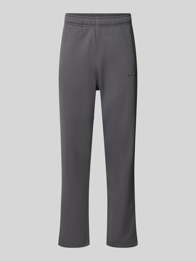 Produktfoto, gerade geschnittene graue Straight Fit Sweatpants aus Baumwoll-Mix Modell 'ICONS' von Champion mit Label-Stitching und Eingrifftaschen, strukturierte Oberfläche, Länge bei Größe M 74 cm