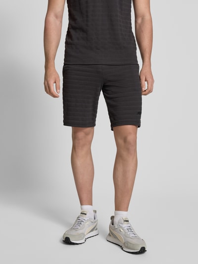PUMA PERFORMANCE Slim Fit Shorts mit Strukturmuster Modell 'ESS ELEVATED' Black 4