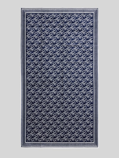 Productfoto, 'Handtuch aus reiner Baumwolle Modell SCRIPT TOWEL' van TOMMY HILFIGER in donkerblauw met allover logo-print patroon, frottétextuur