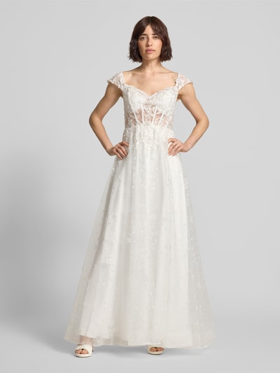 Modelka kobieca nosi Maxikleid mit Pailletten od Unique, biały, krój taliowany, cekiny, tylny zamek, długość pleców 136 cm, szerokość w rozmiarze 36: 35 cm, widok całej sylwetki z przodu