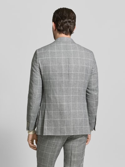Männermodel trägt Slim Fit Pak met linnenmix, ruitpatroon, 2-knoops colbert, persplooien pantalon van CG - Club of Gents, model 'Paul/Paco', rugaanzicht.