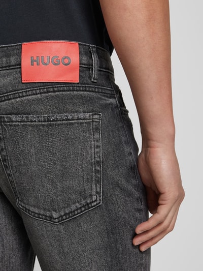 HUGO Jeansy o kroju tapered fit z przetarciami model ‘HUGO 634’ Antracytowy 3