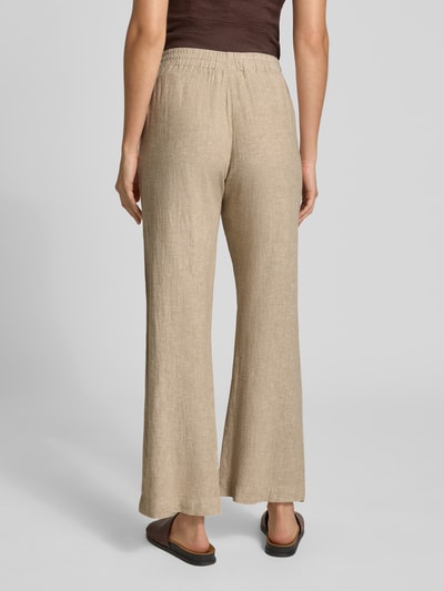 Vrouwenmodel draagt Wide Leg Pants uit linnenmix met elastische taille, model 'Lava' van FREE/QUENT, loose fit, achteraanzicht.