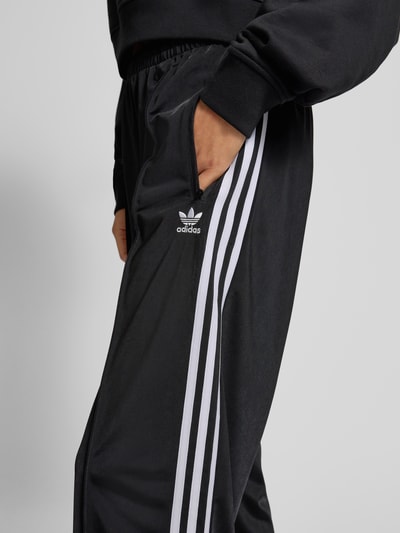 adidas Originals Flared sweatpants met vaste persplooien, model 'FIREBIRD' Zwart - 3