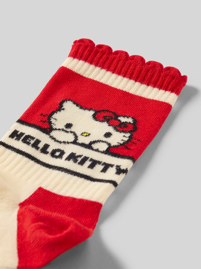 Produktfoto, Socken aus Baumwoll-Mix Modell 'HELLO KITTY KAWAII' von Happy Socks in Rot und Creme mit Muschelsaum und Label-Detail in Ripp-Optik.
