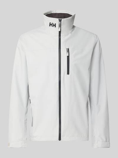 Produktfoto, Regular Fit Jacke mit Stehkragen Modell 'Crew' von Helly Hansen in Weiß mit Logo-Print, Reißverschlusstaschen und Napoleontasche.
