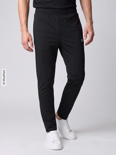 Lacoste Sport Spodnie dresowe o kroju slim fit z naszywką z logo Czarny 4