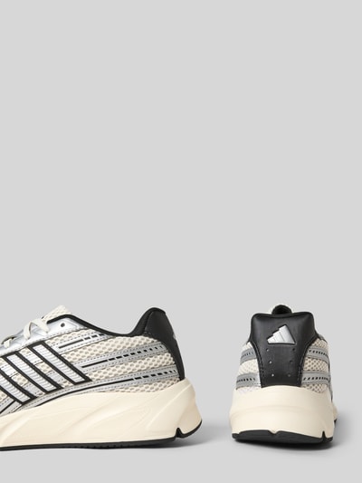 Produktfoto, Sneaker mit Schnürverschluss van adidas Sportswear, dames sneakers met afgeronde punt, labeldetail, structuurzool, hakhoogte 4 cm, schachthoogte 6 cm, schachtbreedte 9 cm, zwart-wit met beige accenten.