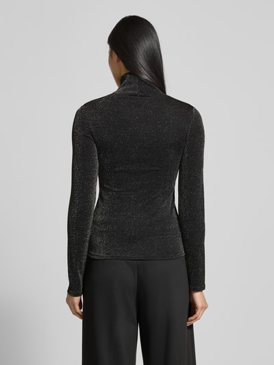 Frauenmodel trägt Longsleeve mit Stehkragen Modell 'Rani' von GUIDO MARIA KRETSCHMER WOMAN, schwarzer Glitter-Effekt, Material-Mix, Slim Fit, Ganzkörperansicht Rückansicht.