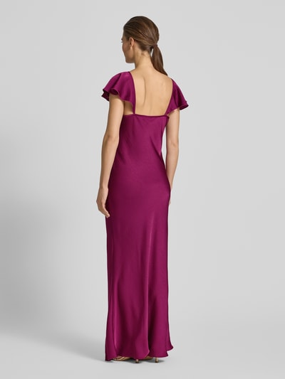 Frauenmodel trägt Fließendes Abendkleid aus Satin Modell 'RITA' von Vero Moda in Optik: Unifarben, Passform: fließend, Maxi-Länge, U-Ausschnitt, Applikation: Satin-Rose, Trägerform: schmale Träger mit Frill, Materialverarbeitung: Satin, Rückansicht Ganzkörperansicht.