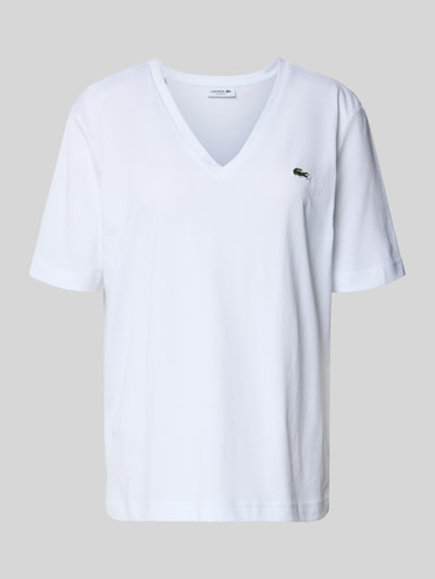 Produktfoto, Relaxed Fit T-Shirt aus reiner Baumwolle von Lacoste in Weiß mit Logo-Stitching und V-Ausschnitt, unifarbene Optik.