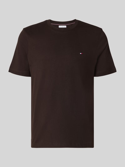 Produktfoto, Regular Fit T-Shirt aus reiner Baumwolle von Tommy Hilfiger in Schwarz, glatte Oberfläche, minimalistisches Design.