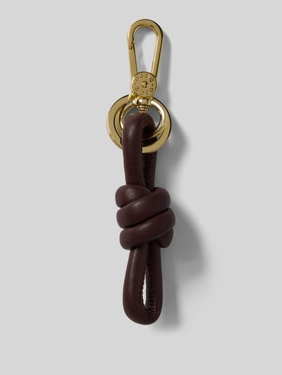 Productfoto, sleutelhanger met knoopdetail van Abro in donkerbruin leer met goudkleurige karabijnhaak en Label in reliëf