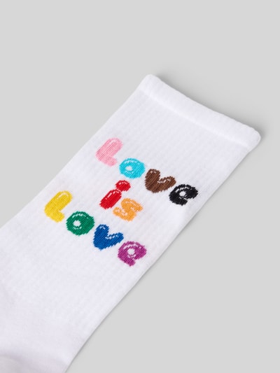 Produktfoto, Socken aus Baumwoll-Mix Modell 'LOVE IS LOVE' von Happy Socks mit mehrfarbigem Schriftzug, Ripp-Optik, elastisches Rippenbündchen.