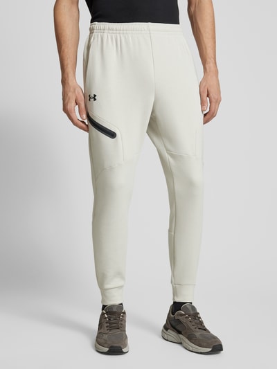 Under Armour Relaxed Fit Sweatpants mit Logo-Print Modell 'Unstoppable' Offwhite 4