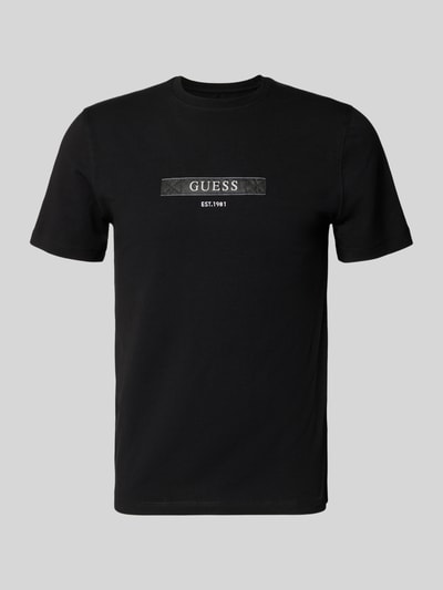 Produktfoto, schwarzes T-Shirt mit Label-Detail von Guess, Regular Fit, Baumwoll-Elasthan-Mix, gerippter Rundhalsausschnitt, glatte Textur