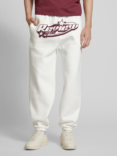 REVIEW Regular Fit Sweatpants mit Label-Print Offwhite 4